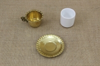 Brass Coffee Cup First Depiction